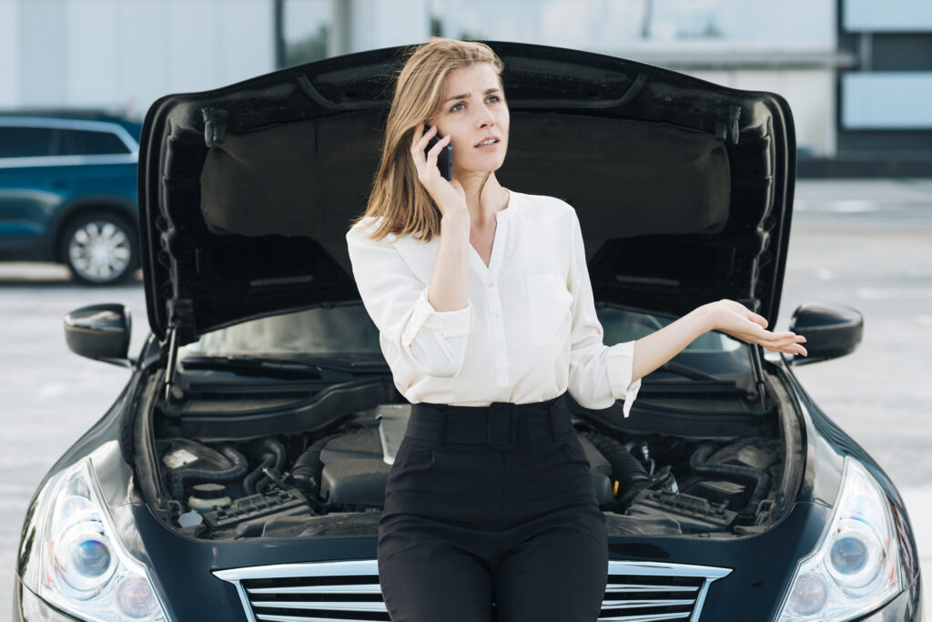 car woman talking phone